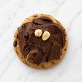 Chocolate cookie with nuts and and cream